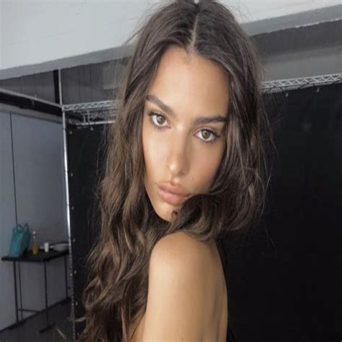 Emily Ratajkowski Puts On Cheeky Display In Barely-There Bathing Suit