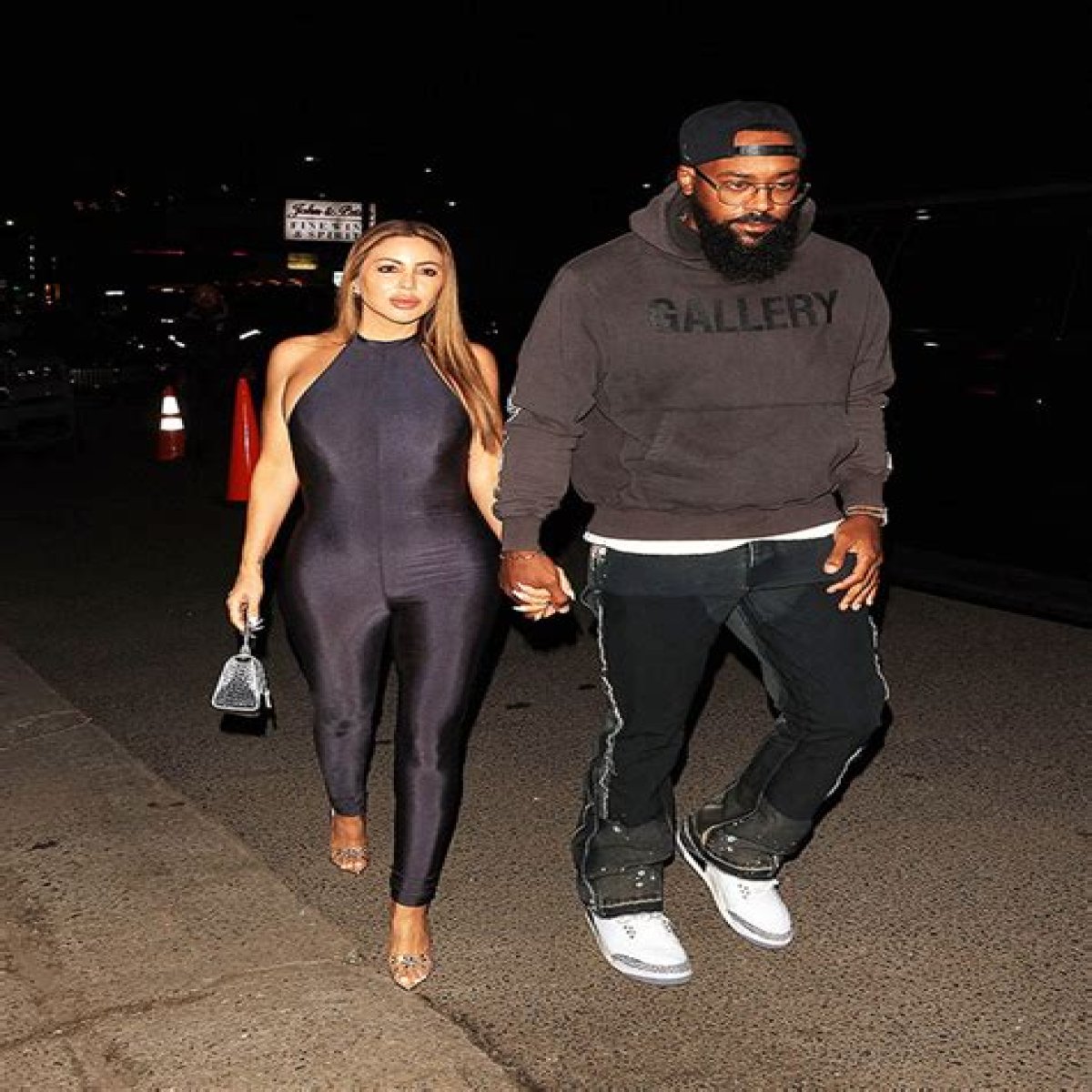 Larsa Pippen Stuns In Skintight Jumpsuit While Posing In Front Of A Red Ferrari 