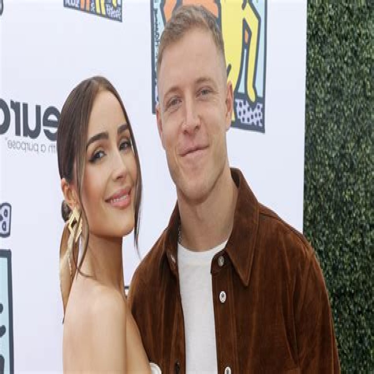 Olivia Culpo And Christian McCaffrey Clap Back at Troll for Comment About Her Wedding Dress